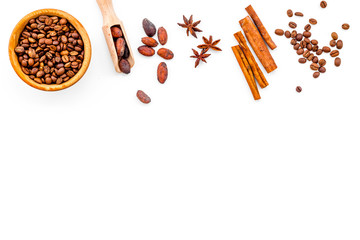 Ingredients for bakery and desserts. Cinnamon, cocoa, sugar, spices on white background top view space for text