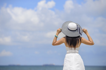 Woman in summer vacation wearing hat