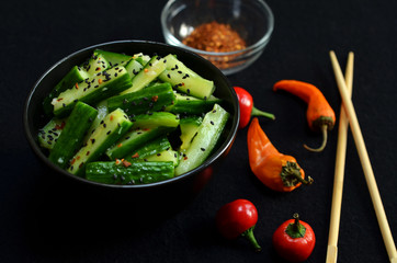 Fresh cucumber with black sesame in Asian style