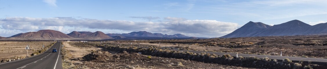 panoramic view of old and new street in Timanfaya national park
