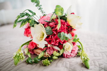 A wedding bouquet of roses.
