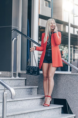 Smiling woman talking on the phone