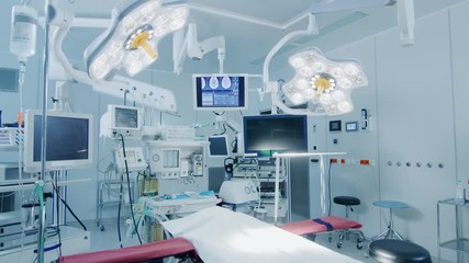 Establishing Shot of Technologically Advanced Operating Room with No People, Ready for Surgery. Real Modern Operating TheaterWith Working Equipment. Shot on RED EPIC-W 8K. - Powered by Adobe