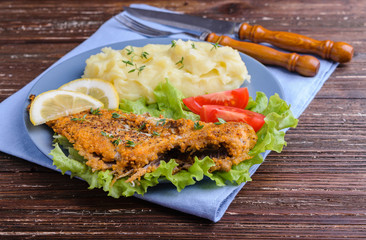 Fried fish with mashed potatoes