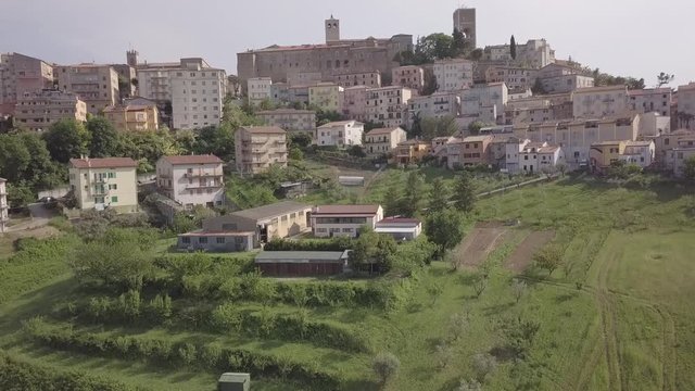 Aerial view of the municipality of Osimo, in the province of Ancona, in the Marche region, in Italy. The historic center with its walls, roofs, squares is a mountain tourist destination.