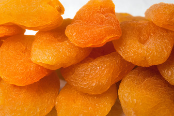 Bright orange texture of dried apricots close-up