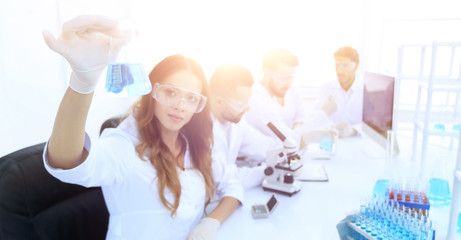 group of young scientists working in the laboratory.