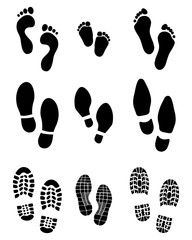 Black prints of human feet and shoes on a white background