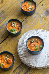 Bowls of pumpkin cream soup