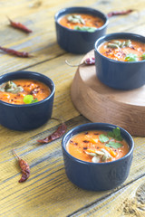 Bowls of pumpkin cream soup