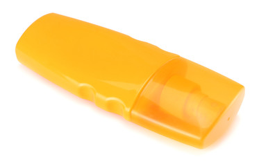 suntan cream bottle isolated on white background