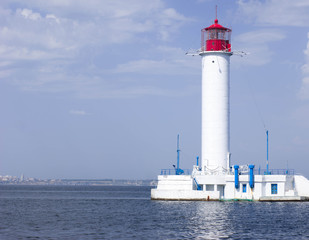 Fototapeta na wymiar lighthouse on a sunny day with blue sky
