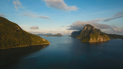 Tropical bay in El Nido. Aerial view: bay and the tropical islands. Tropical landscape. Sky and mountains rocks. Seascape:sky, mountains, ocean.Philippines, El Nido. Travel concept