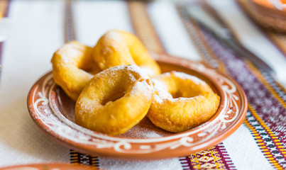Russian donut  in bowl on wooden table