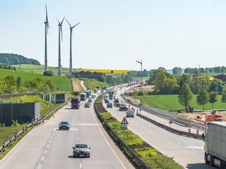 german autobahn and wind tubines construction energiewende