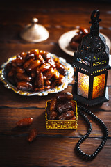 The Muslim feast of the holy month of Ramadan Kareem. Beautiful background with a shining lantern Fanus.