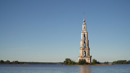 Ancient Christian church located on an island in the middle of the lake. Aerial view Old monastery.