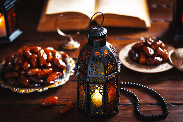 The Muslim feast of the holy month of Ramadan Kareem. Beautiful background with a shining lantern Fanus.