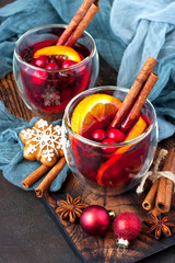 Mulled wine with slice of orange and spices