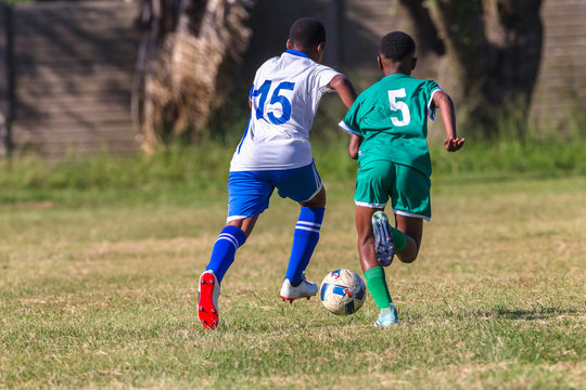 Football Soccer Junior Players Ball Action
