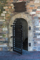 Antique Open Metallic Door, Ancient Entrance in Old Brickwork Building