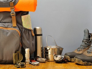 Holidays and Travel accessories set on gray background. Athletic Life Style. Top view point © Anton