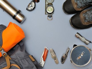 Holidays and Travel Equipment set on gray background. Athletic Life Style. Top view point. Flat lay. © Anton