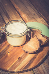 Coconut flakes in a shell on a blue background