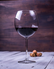 bottle and glass with red wine