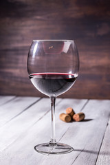 bottle and glass with red wine