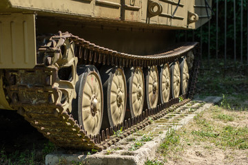 Tank caterpillar in a military museum. Old military equipment on display.