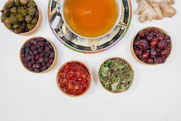 tea for health, ginger tea, flax, grass, strawberries, cones, hawthorn, canina-rose