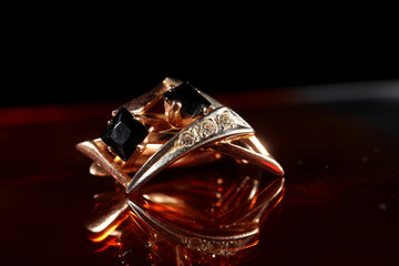 Women's jewelry made of gold and shot close-up