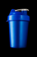 Obraz premium Shaker for protein powder isolated on black background