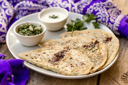 Azerbaijani traditional cuisine. Qutabs served with yogurt.