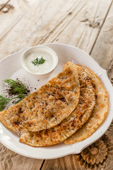 Azerbaijani traditional cuisine. Meat qutabs flatbread served
