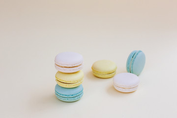 Macaroons on a yellow background. 