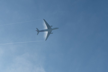 plane flying in mist