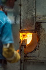 Pocos de Caldas, Minas Gerias/Brazil. Crystal glass melting in hot oven ready to be shaped