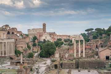Fototapeta na wymiar The Roman Forum, also known by its Latin name Forum Romanum, is a rectangular forum surrounded by the ruins of several important ancient government buildings at the center of the city of Rome