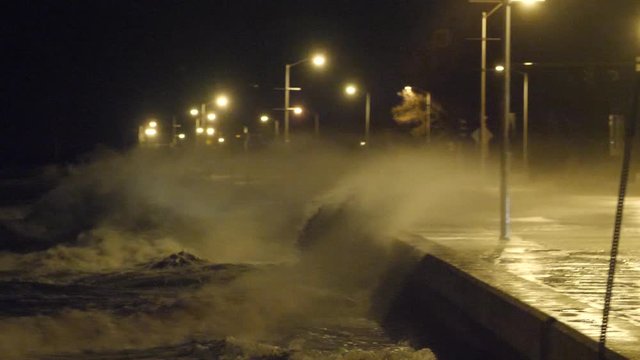 Storm Surge Crashes Over Seawall 