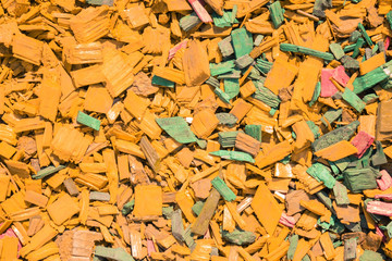 Yellow background of sawdust.