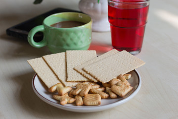 Coffee with  bread  in the morning on Desk for work
