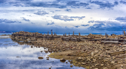 Baikal, Olkhon. Remains of the pier of the fish factory at the Peschanoye tract