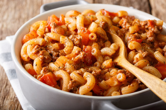 American chop suey - American pasta dish , beef as tomato sauce. close-up. Horizontal