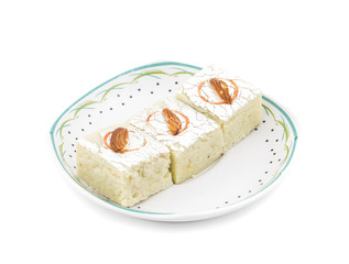 Indian Sweet Food Badam Barfi Also Know As Mithai, barfee, Mawa Barfi, Mava barfi, Almond Sweet, khoya Burfi Indian Popular Sweet Made up of Coconut, Mawa, Milk and Sugar isolated on white background