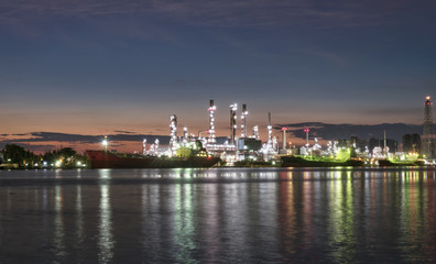 Refinery industry and boat at Twiligth