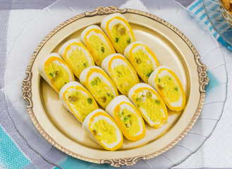 Indian Sweet Food Barfi Also Know as Dry Fruits Sweet, Mithai, barfee, Mawa Barfi, Mava barfi, khoya Burfi, orange and yellow barfi Indian Popular Sweet Made up of Coconut, Mawa, Milk and Sugar