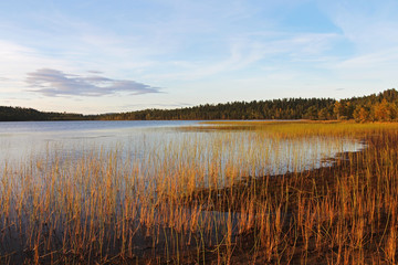 Indian Summer and autumn colors on a lake in Finland, Europe