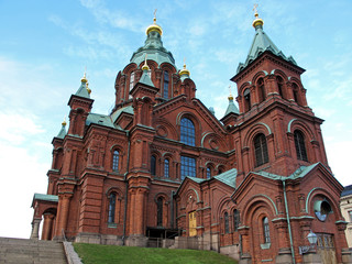 Fototapeta na wymiar Uspenski Cathedral on hill, red turquoise orthodox church, Helsinki, Finland, Europe